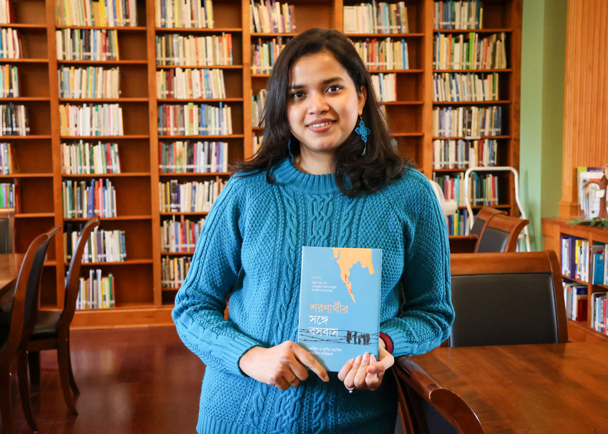 ibtesum Afrin holding book